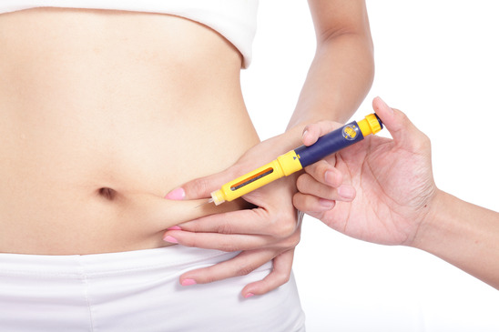 close up of woman inject drugs to prepare for treatment